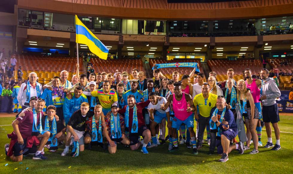 Las Vegas Lights FC goalkeeper Thomas Olsen (1) stands for a group photo with visiting IFC Sub ...