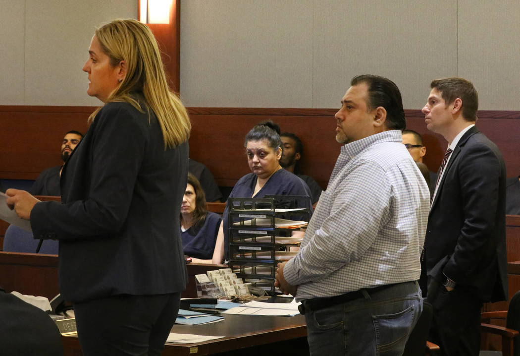 Sherry Marks, second left, and her brother David Marks, second right, accused of swindling a la ...