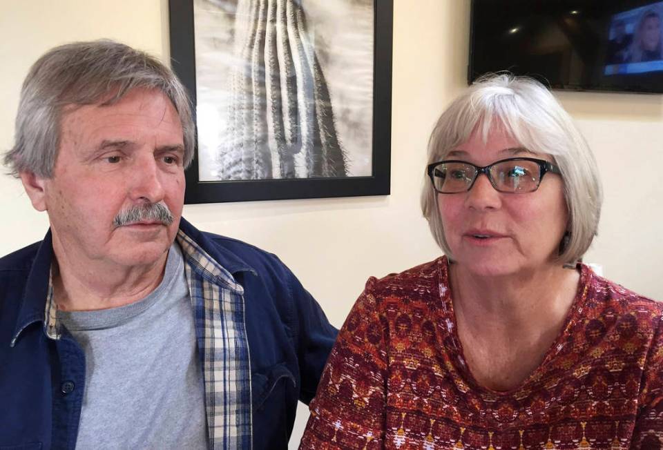 In this 2018 photo, Mark Warren and his wife Pam Warren talk about their son, Scott Daniel Warr ...