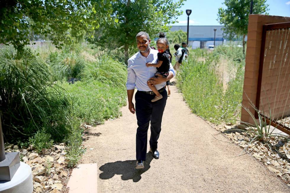 U.S. Rep. Steven Horsford, D-Nev., walks the Kiel Ranch Historic Park in North Las Vegas with R ...