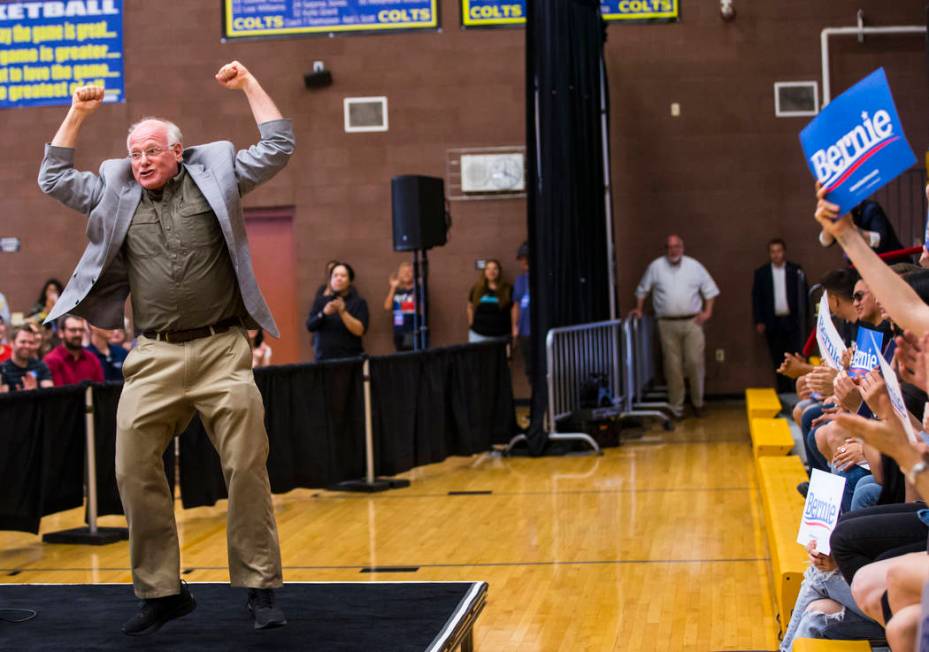 Ben Cohen, co-founder of Ben & Jerry's, cheers in support of Democratic presidential candid ...