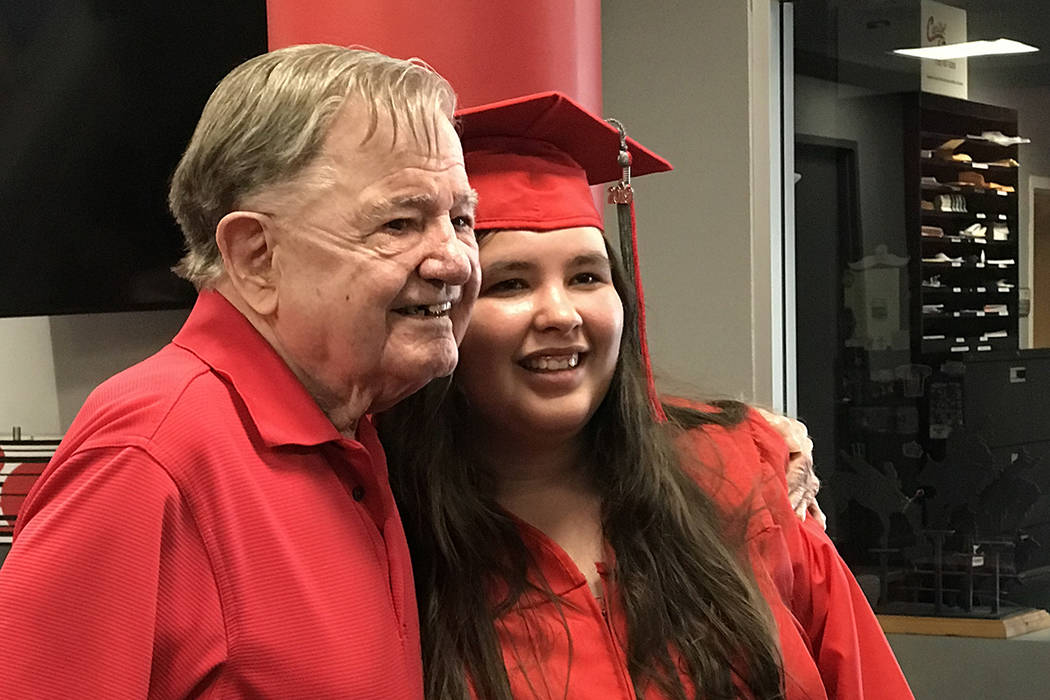 Joseph "Joe" Kelly and his granddaughter, Kimberly Ann Johnson, at her graduation from UNLV on ...