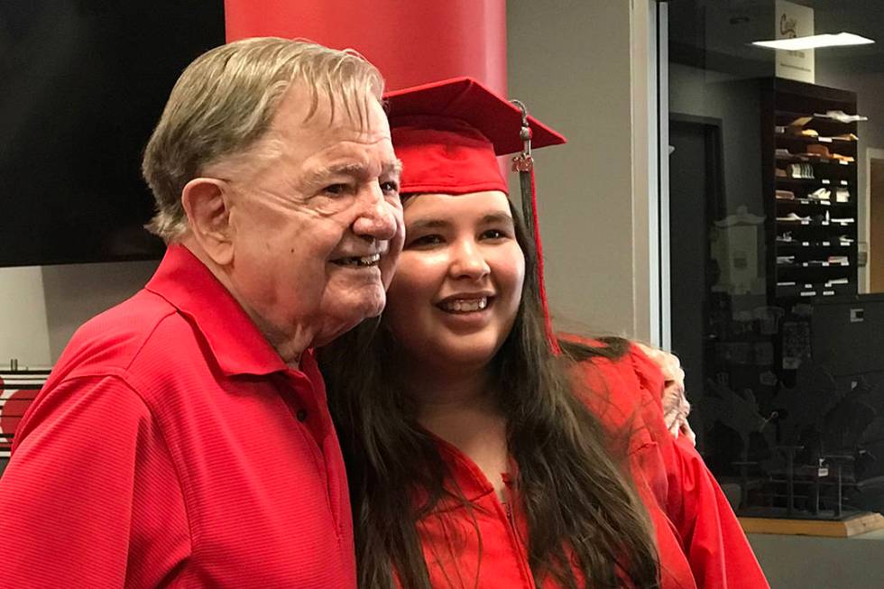Joseph "Joe" Kelly and his granddaughter, Kimberly Ann Johnson, at her graduation from UNLV on ...