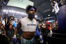 Dallas Cowboys running back Ezekiel Elliott (21) heads to the clubhouse after an NFC wild-card ...