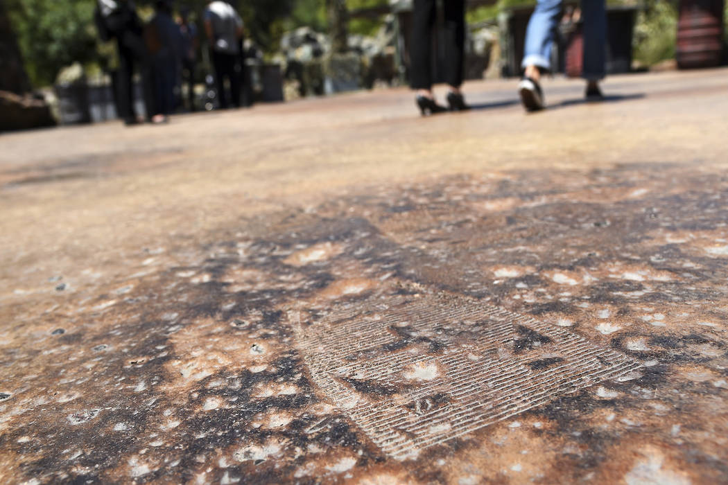 A GNK power droid footprint is pictured on a walking path during the Star Wars: Galaxy's Edge M ...