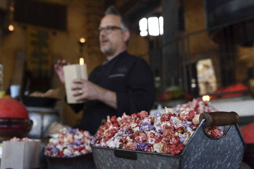 Flavored popcorn from Kat Saka's Kettle is pictured as John D. State, culinary director of Disn ...
