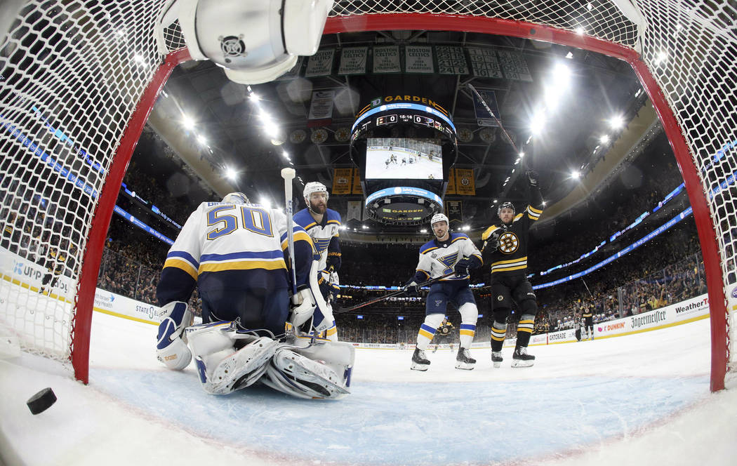 Boston Bruins' Charlie Coyle, right, celebrates his power play goal against St. Louis Blues goa ...