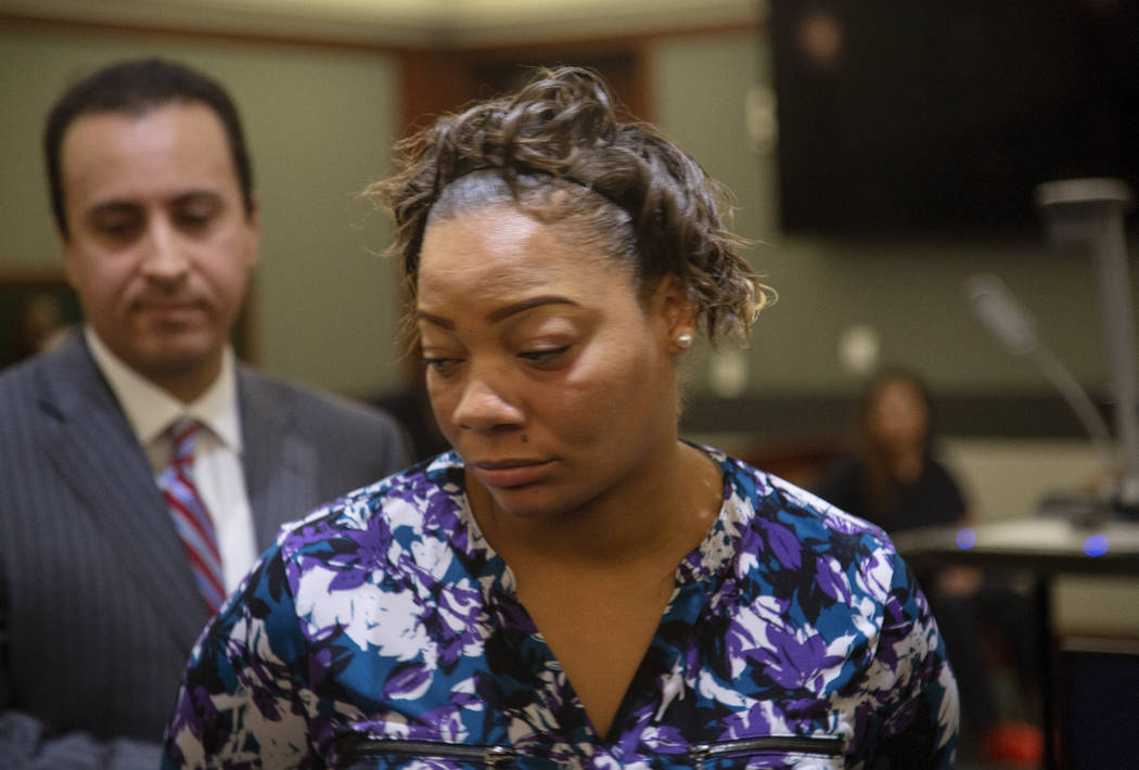 Cadesha Bishop, 25, accused of shoving a 74-year-old man off a bus, appears in court at the Reg ...