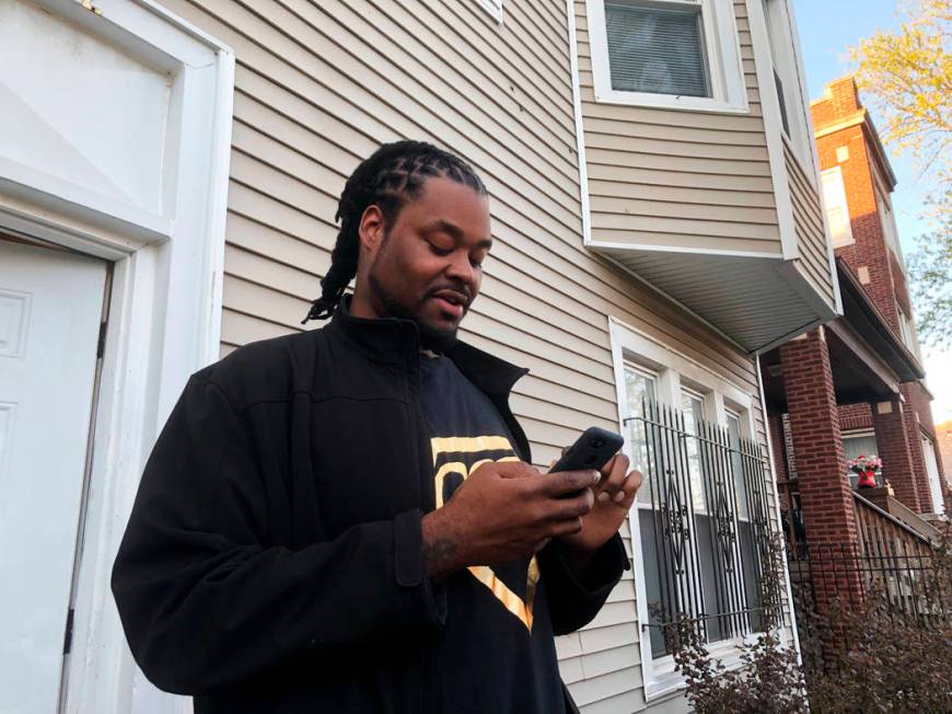 In this May 13, 2019 photo, Riccardo Holyfield stands outside his home on the Southside neighbo ...