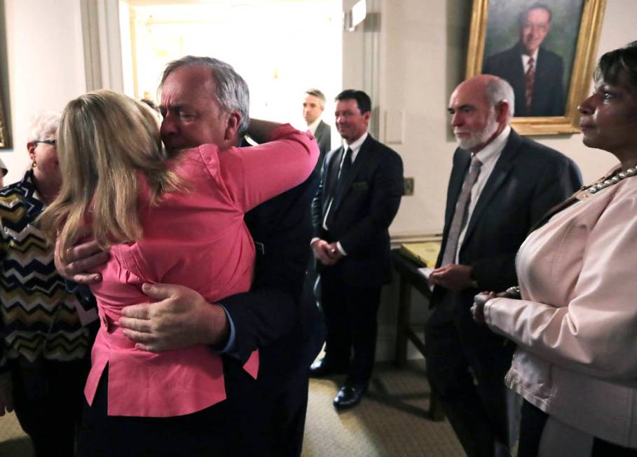 State Rep. Renny Cushing, D-Hampton, right, embraces state Senate President Donna Soucy after a ...