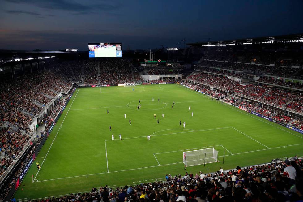 D.C. United and Vancouver Whitecaps play during the first half of an MLS soccer match, in this ...