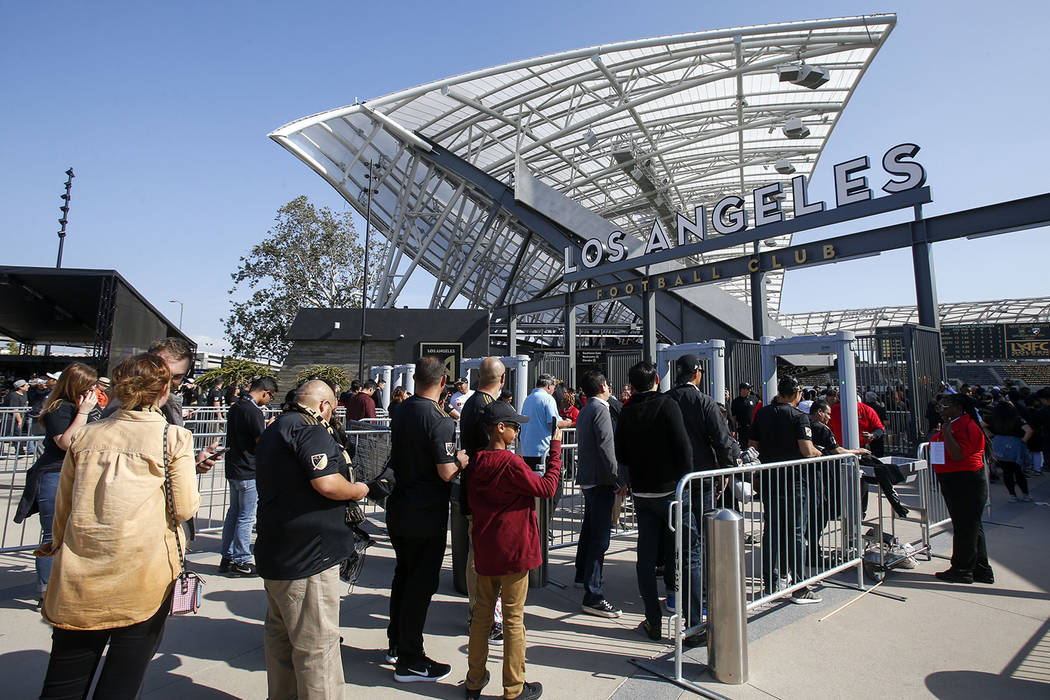 Fans line up for an MLS soccer game between Los Angeles FC and Seattle Sounders at the new Banc ...