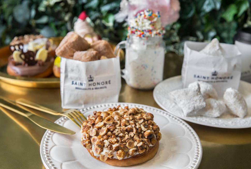 Clockwise from bottom/left: Champs Elysees doughnut, Saint Honore original beignets, Party Like ...