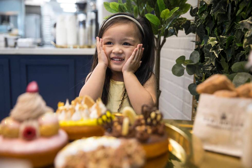 Ava Qassamali, 3, is overwhelmed by all the dessert choices at Saint Honore on Saturday, June 1 ...