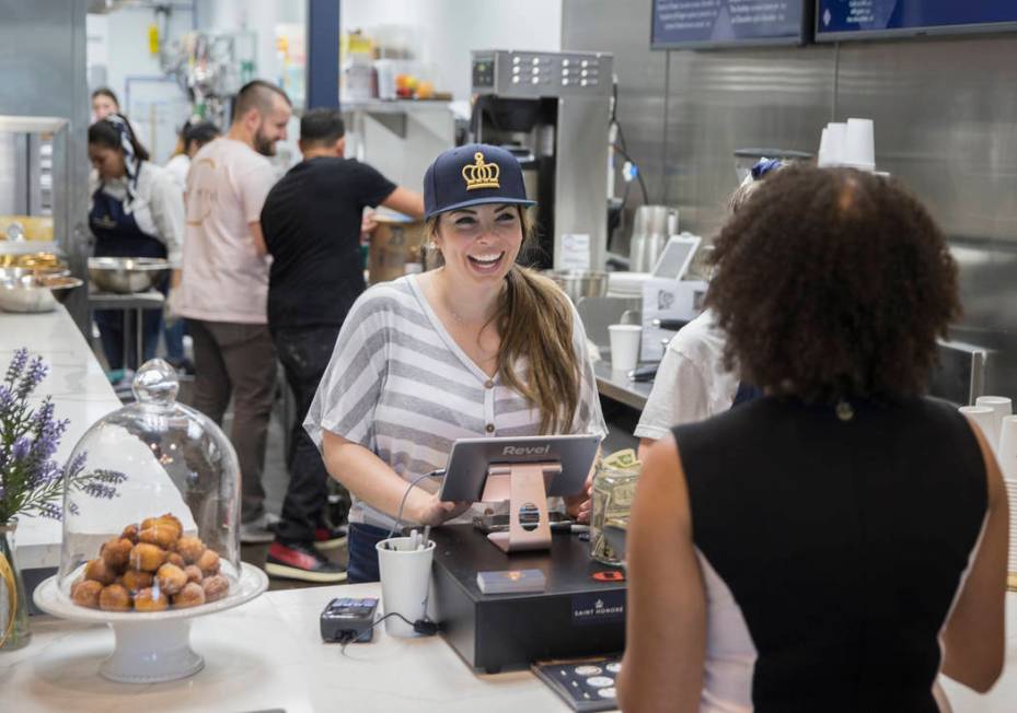 Alexandra Lourdes, middle, takes an order at Saint Honore on Saturday, June 1, 2019, in Las Veg ...