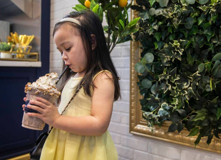 Ava Qassamali, 3, drinks her milkshake at Saint Honore on Saturday, June 1, 2019, in Las Vegas. ...