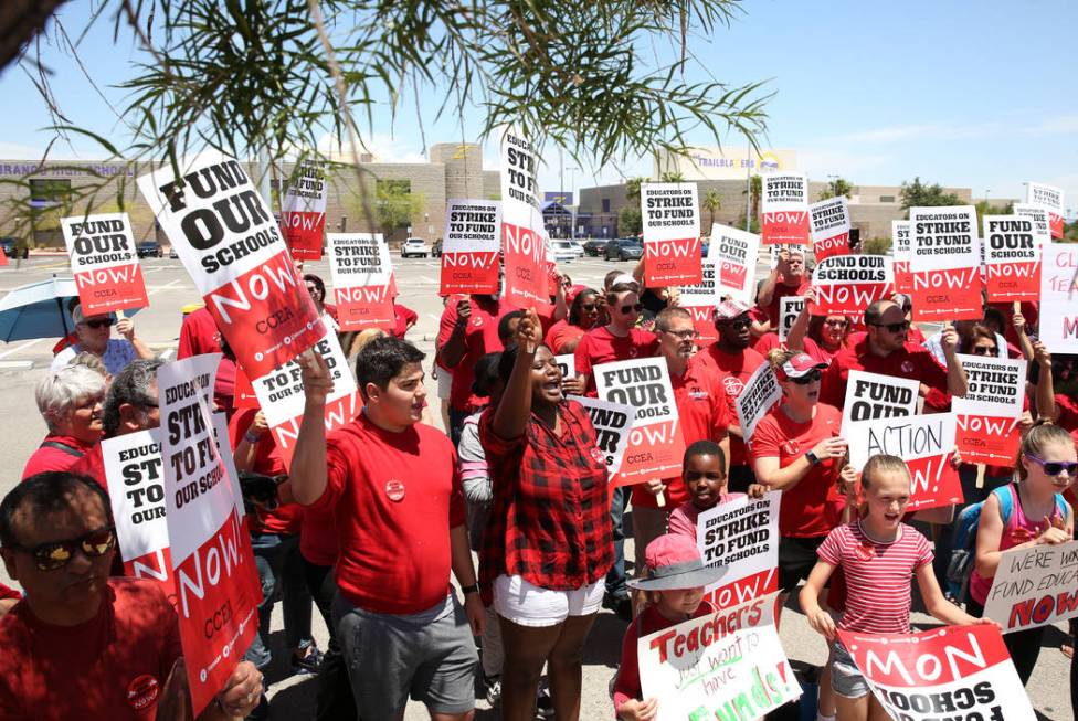 About 50 members and supporters of the Clark County Education Association protest in front of D ...