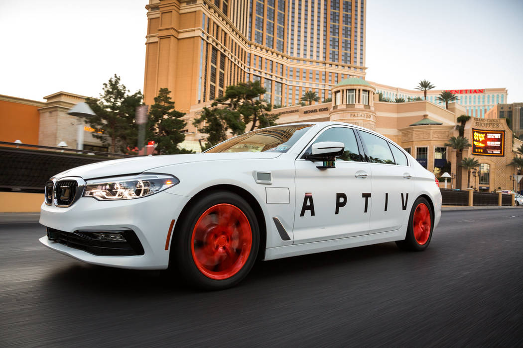 The APTIV vehicle with autonomous technology drives on the Las Vegas Strip, Dec. 1, 2017. (John ...