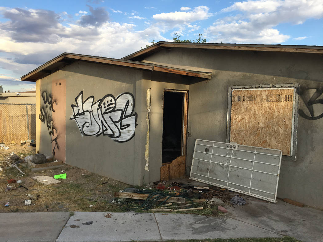 A boarded-up, foreclosed house at 600 Kasper Ave., photographed on Friday, May 31, 2019, in Las ...