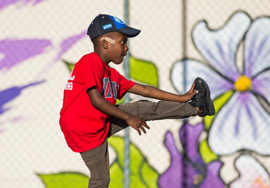 Devori Brown, 6, stretches during a youth clinic hosted by UNLV head basketball coach T.J. Otze ...