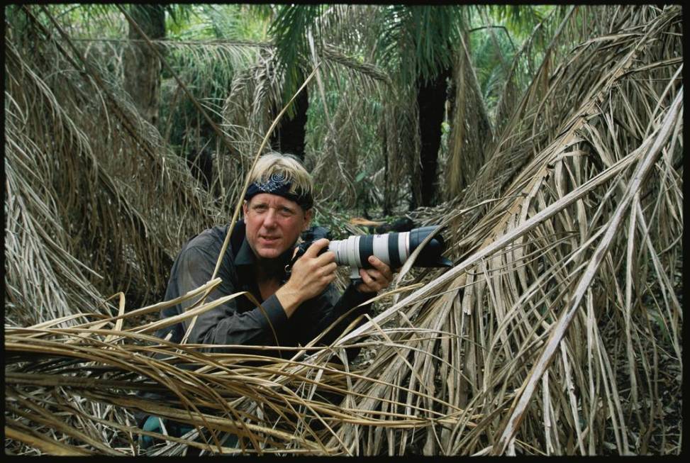 Photographer Steve Winter in the wild waits to photograph a jaguar (Steve Winter)