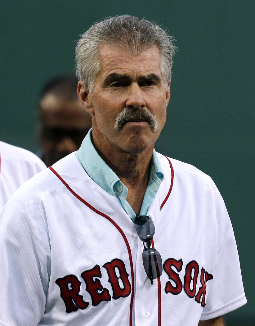FILE - In this May 25, 2016, file photo, former Boston Red Sox player Bill Buckner looks on pri ...