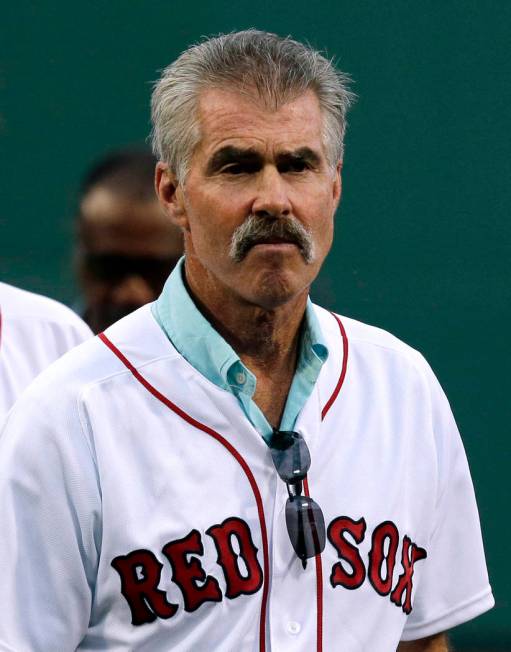 FILE - In this May 25, 2016, file photo, former Boston Red Sox player Bill Buckner looks on pri ...