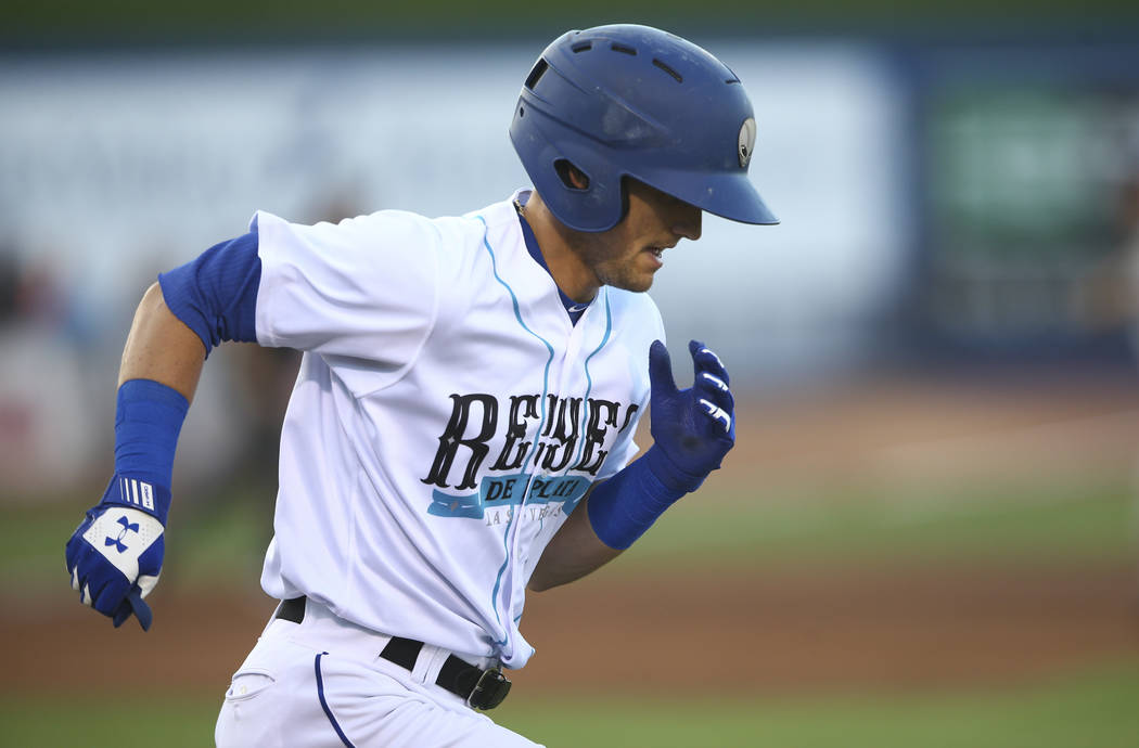 Las Vegas 51s' Gavin Cecchini runs for first base during the debut of the "Reyes de Plata" (Sil ...
