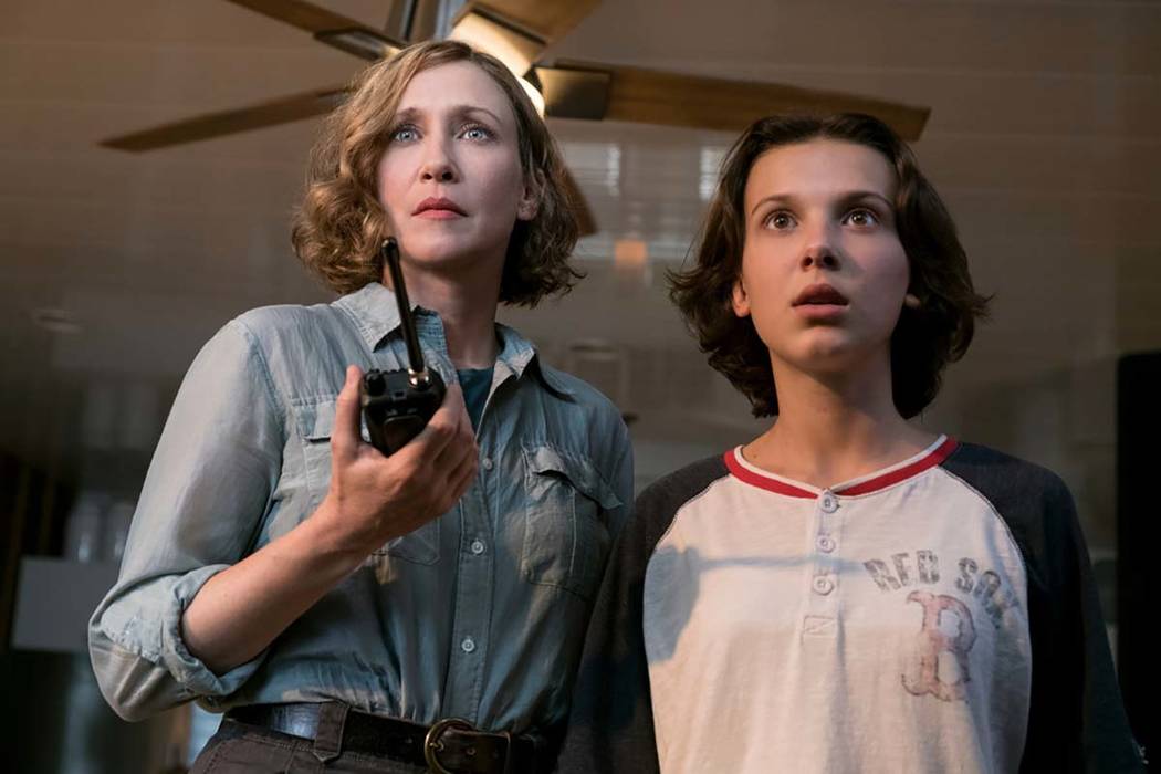 This image released by Warner Bros. Pictures shows Vera Farmiga, left, and Millie Bobby Brown i ...