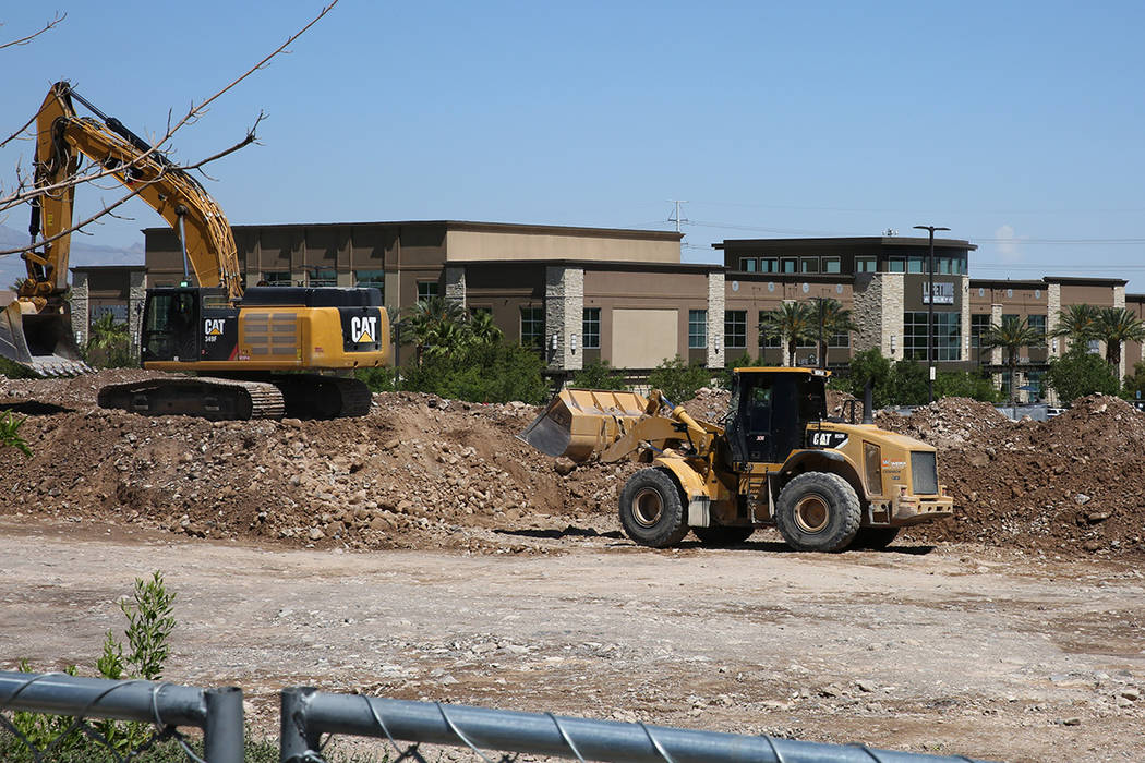 A luxury apartment complex construction site behind Lifetime Athletic is seen on Monday, June, ...