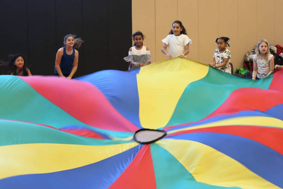 Children, including Emma Molfetta, second left, Vittoria Tesfaye, and Myah-Becerra-Malone, thir ...