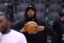 Golden State Warriors Kevin Durant watches during basketball practice at the NBA Finals in Toro ...