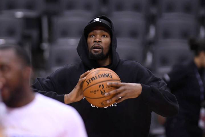 Golden State Warriors Kevin Durant watches during basketball practice at the NBA Finals in Toro ...