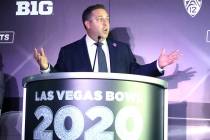 Las Vegas Bowl Executive Director John Saccenti gestures at the announcement for the Mitsubishi ...