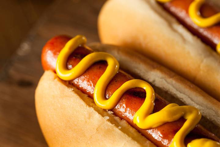 Grilled hot dog with yellow mustard. (Getty Images)