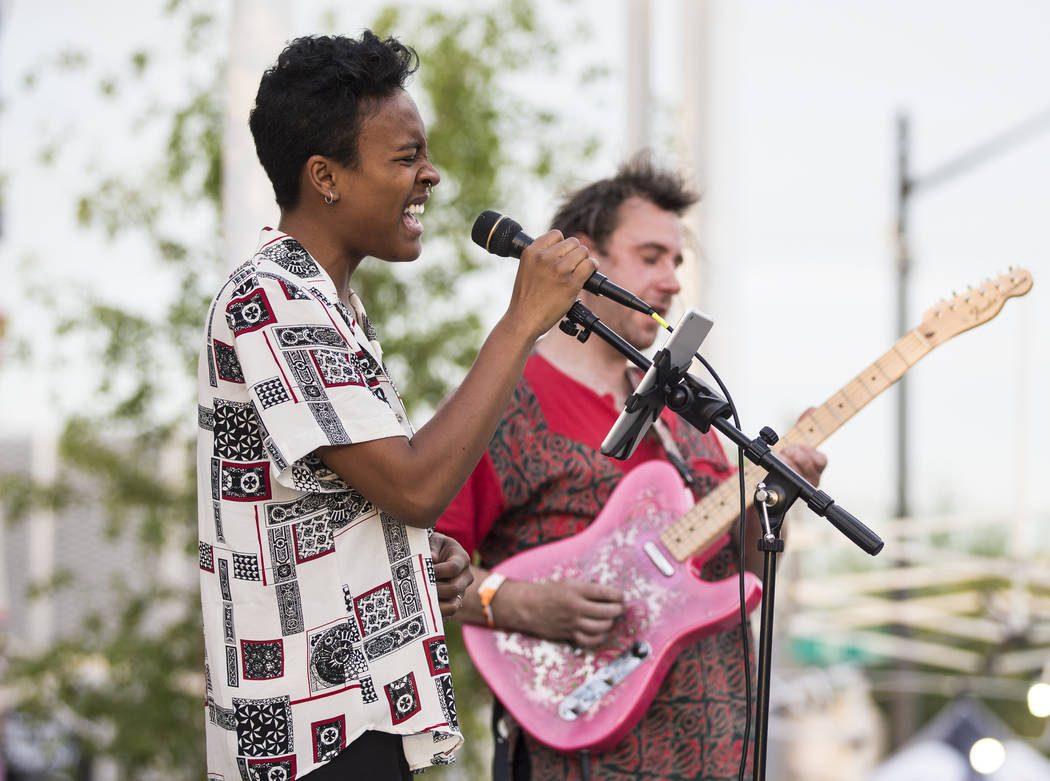 Byana Hinton, left, performs with Dylan Meistrich during First Friday's "Beat Street" ...