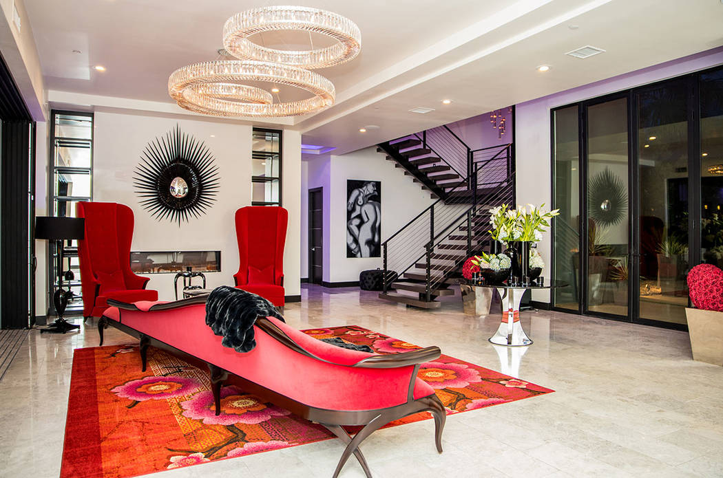 The entry features a unique red chase. (Tonya Harvey Real Estate Millions)