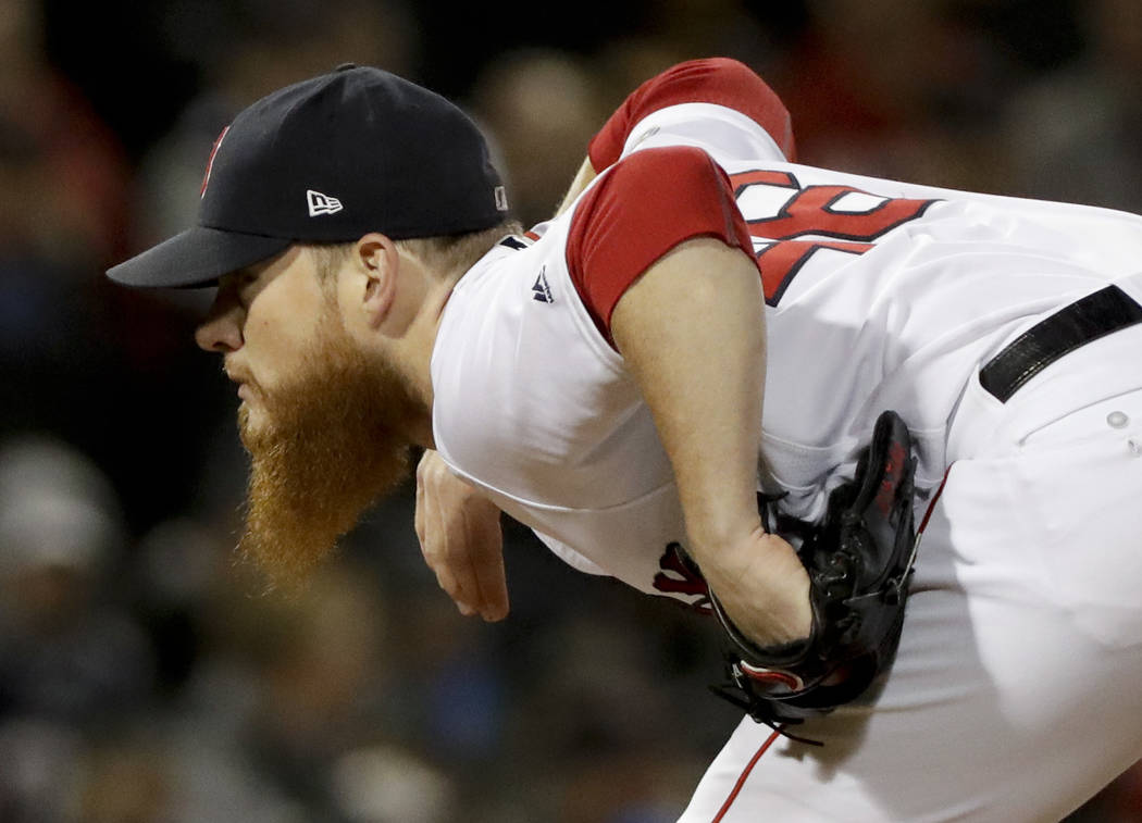 Boston Red Sox relief pitcher Craig Kimbrel looks to throw during the ninth inning in Game 2 of ...