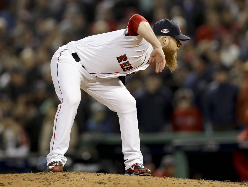Boston Red Sox relief pitcher Craig Kimbrel looks to throw during the ninth inning in Game 2 of ...