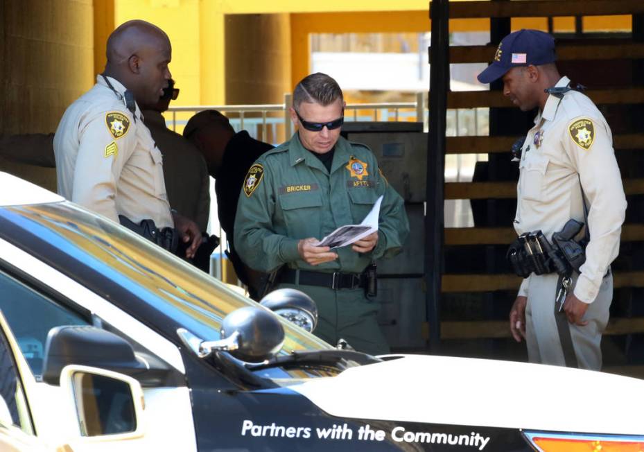 Las Vegas police investigate a bomb threat at a Siegel Suites at 455 E. Twain Ave., Friday, Jun ...