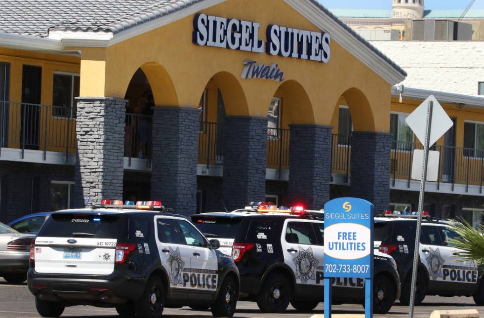 Las Vegas police investigate a bomb threat at a Siegel Suites at 455 E. Twain Ave., Friday, Jun ...