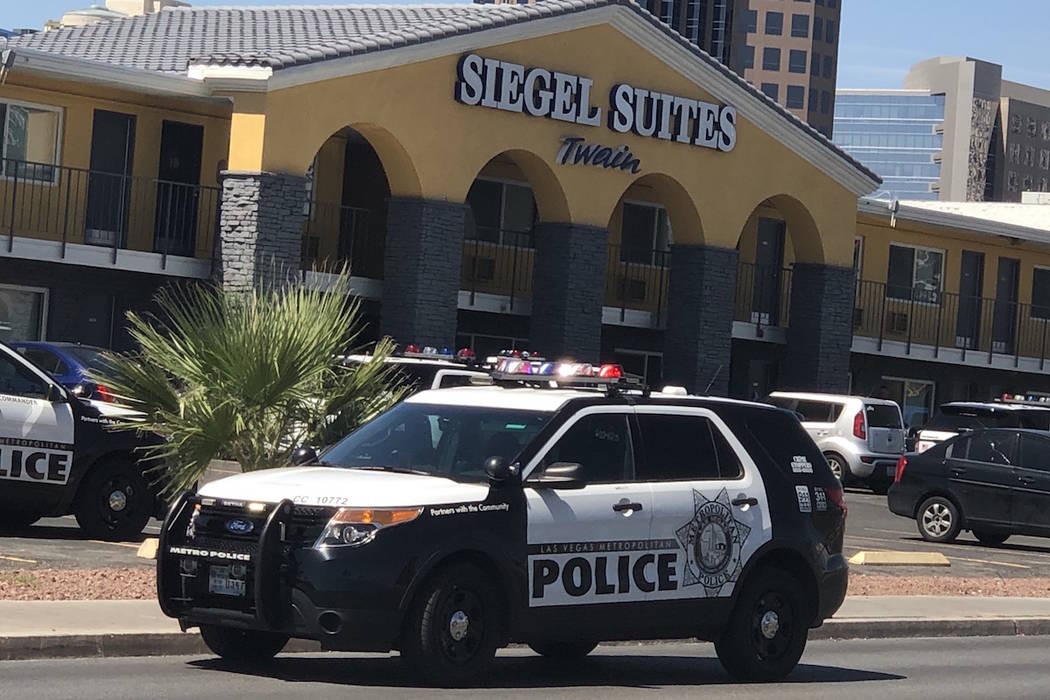 Las Vegas police investigate a bomb threat at Siegel Suites at 455 E. Twain Ave. in Las Vegas. ...