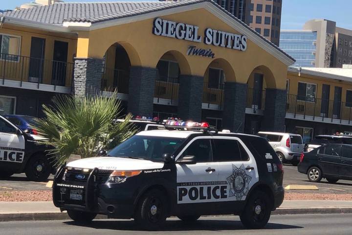 Las Vegas police investigate a bomb threat at Siegel Suites at 455 E. Twain Ave. in Las Vegas. ...