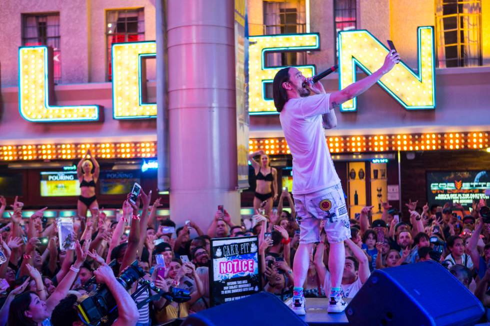 Steve Aoki performs on the Main Street Stage at the Fremont Street Experience after the debut o ...