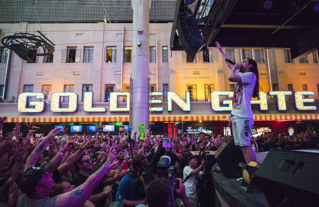 Steve Aoki performs on the Main Street Stage at the Fremont Street Experience after the debut o ...