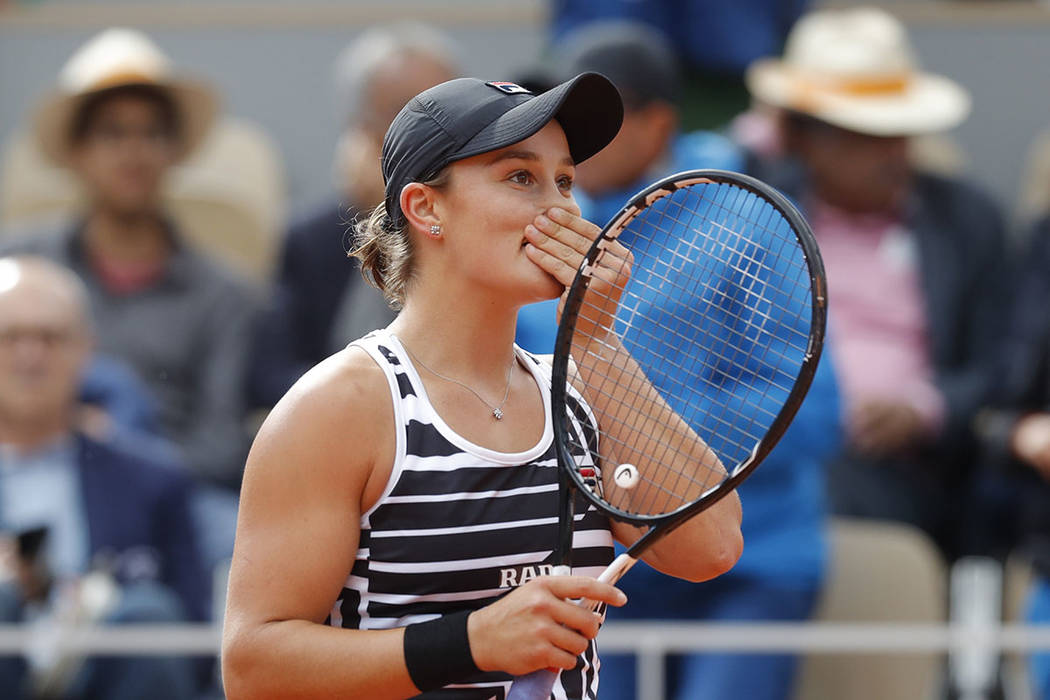 Australia's Ashleigh Barty celebrates winning her women's final match of the French Open tennis ...