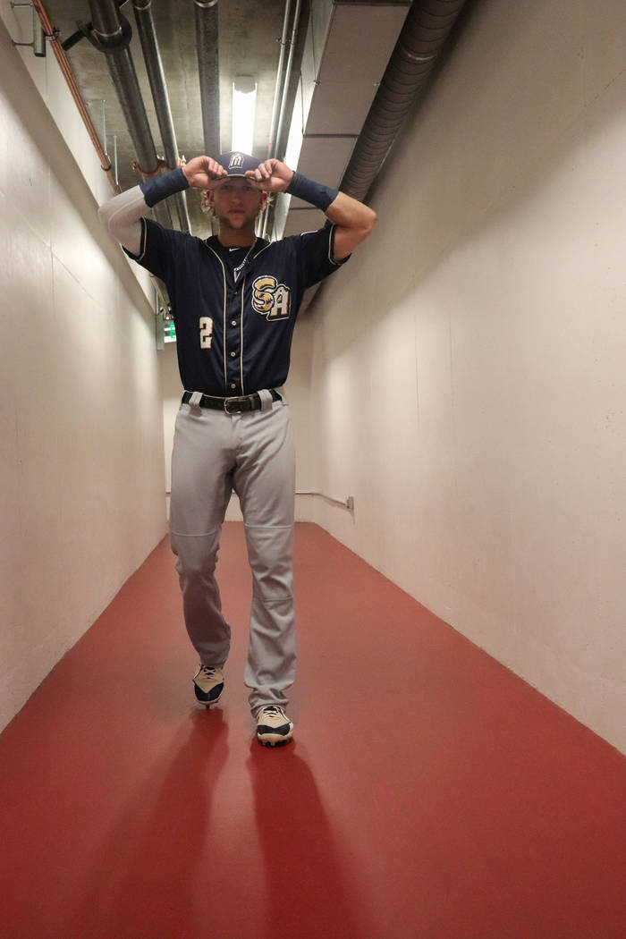 San Antonio infielder Jake Hager walks through the tunnel ahead of a game against the Aviators ...