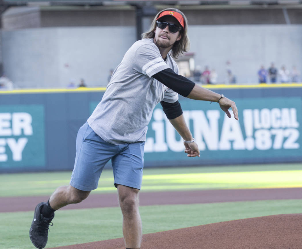 Kaden Manczuk throws out the first pitch before the start of the Las Vegas Aviators Triple A ba ...