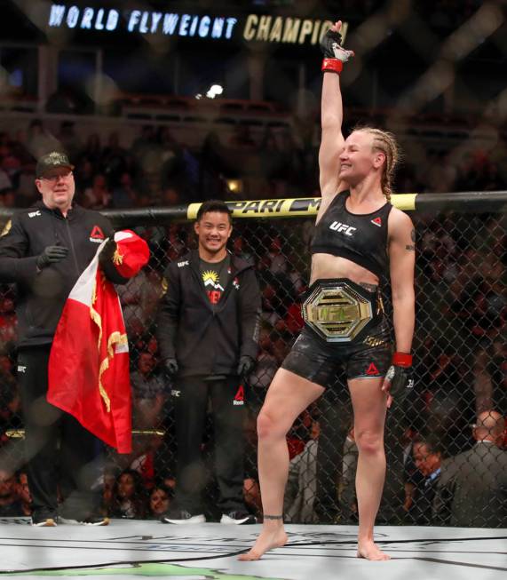 Valentina Shevchenko celebrates after defeating Jessica Eye during their women's flyweight titl ...