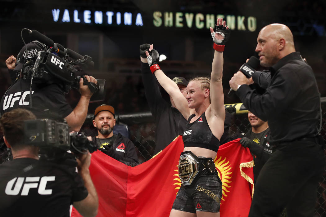 Valentina Shevchenko celebrates after defeating Jessica Eye during their women's flyweight titl ...